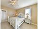 Bedroom with a queen bed, nightstands, and en-suite bathroom at 758 Parker Dr., Pawleys Island, SC 29585