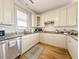 Bright kitchen with granite countertops and stainless steel appliances at 758 Parker Dr., Pawleys Island, SC 29585