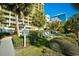 Landscaped grounds with lounge chairs near the resort at 1200 N Ocean Blvd. # 308, Myrtle Beach, SC 29577