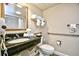 Clean bathroom with granite vanity and accessible features at 1200 N Ocean Blvd. # 308, Myrtle Beach, SC 29577