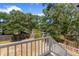 Backyard with a wooden fence and lush green grass at 1024 Lakeside Dr., Surfside Beach, SC 29575