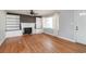 Living room with hardwood floors, fireplace and built-in shelves at 1916 Jasper St., Georgetown, SC 29440