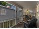 Relaxing covered porch with outdoor seating, creating a comfortable outdoor space at 6001 - 1824 S Kings Hwy., Myrtle Beach, SC 29575