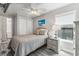 Cozy bedroom with a double bed, nightstand, and ceiling fan at 6001 - 1824 S Kings Hwy., Myrtle Beach, SC 29575