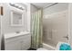 Clean bathroom with shower/tub combo and white vanity at 6001 - 1824 S Kings Hwy., Myrtle Beach, SC 29575
