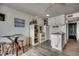 Efficient kitchen with white cabinets and appliances at 116 South Waccamaw Dr. # 204, Garden City Beach, SC 29576