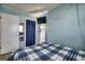Guest bedroom with a full-size bed and dresser at 116 South Waccamaw Dr. # 204, Garden City Beach, SC 29576