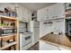 White cabinets, wood countertop, and appliances at 116 South Waccamaw Dr. # 204, Garden City Beach, SC 29576