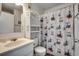 Clean and well-maintained bathroom with shower/tub combo at 116 South Waccamaw Dr. # 204, Garden City Beach, SC 29576