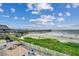 Enjoy breathtaking ocean views from this beachside property at 116 South Waccamaw Dr. # 204, Garden City Beach, SC 29576