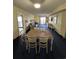 Bright dining area with table and chairs, adjacent to living room at 7100 N Ocean Blvd. # 523, Myrtle Beach, SC 29572