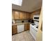 Well-equipped kitchen featuring wood cabinets and modern appliances at 7100 N Ocean Blvd. # 523, Myrtle Beach, SC 29572