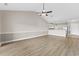 Bright and airy living room with hardwood floors and high ceilings at 124 South Shore Blvd. # 303, Longs, SC 29568