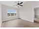 Spacious bedroom with ceiling fan and hardwood floors at 124 South Shore Blvd. # 303, Longs, SC 29568