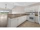 Well-equipped kitchen featuring white cabinetry and granite countertops at 124 South Shore Blvd. # 303, Longs, SC 29568