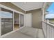 Balcony with sliding glass doors leading to interior at 124 South Shore Blvd. # 303, Longs, SC 29568