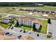 Apartment building with surrounding parking and nearby construction at 124 South Shore Blvd. # 303, Longs, SC 29568