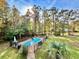 Inviting kidney-shaped pool with a fenced backyard at 6005 Saint Peters Church Rd., Myrtle Beach, SC 29588