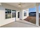 Covered patio with ceiling fan, access to backyard at 181 Azure Loop, Myrtle Beach, SC 29588