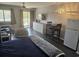 Open studio apartment with a comfortable sitting area and bed at 1100 Possum Trot Rd. # F-224, North Myrtle Beach, SC 29582