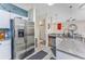 Modern kitchen with stainless steel appliances, granite countertops, and ample cabinet space at 127 Garden City Connector # 210, Murrells Inlet, SC 29576