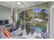 Spacious screened porch overlooking water at 127 Garden City Connector # 210, Murrells Inlet, SC 29576