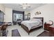 Spacious bedroom with large window and ceiling fan at 127 Garden City Connector # 210, Murrells Inlet, SC 29576