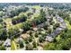 Aerial view of home and surrounding neighborhood near golf course at 3420 Cedar Creek Run, Little River, SC 29566