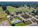 Aerial view of community amenities including clubhouse and pool at 3420 Cedar Creek Run, Little River, SC 29566