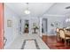 Bright and spacious foyer with tile floors and views to living and dining areas at 3420 Cedar Creek Run, Little River, SC 29566