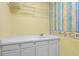 Bright laundry room with a sink and built-in shelving at 3420 Cedar Creek Run, Little River, SC 29566