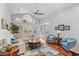 Spacious living room with vaulted ceiling, hardwood floors, and cozy seating at 3420 Cedar Creek Run, Little River, SC 29566