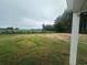 Open backyard view overlooking a field at 1884 Mount Zion Rd., Loris, SC 29569