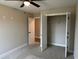 Bedroom with ceiling fan and double door closet at 1884 Mount Zion Rd., Loris, SC 29569