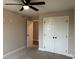 Bedroom with ceiling fan and double door closet at 1884 Mount Zion Rd., Loris, SC 29569