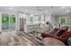 Open concept kitchen with white cabinets, stainless steel appliances, and an island at 1612 16Th Ave., Conway, SC 29526