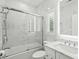 Clean bathroom with white vanity, marble shower, and window at 1612 16Th Ave., Conway, SC 29526