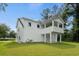 White two-story house with a deck, and a well-maintained lawn at 1612 16Th Ave., Conway, SC 29526