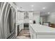 Modern kitchen with stainless steel appliances and white cabinetry at 1612 16Th Ave., Conway, SC 29526