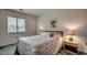 Bright bedroom with double bed and window coverings at 4103 Pinehurst Circle # Bb-11, Little River, SC 29566