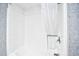 Simple bathroom with shower/tub and white curtain at 210 75Th Ave. N # 4034, Myrtle Beach, SC 29572