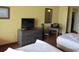 Two double beds, dresser, and small dining table at 1501 S Ocean Blvd. # 429, Myrtle Beach, SC 29577