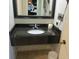 Bathroom with granite countertop vanity, offering a modern feel at 1501 S Ocean Blvd. # 429, Myrtle Beach, SC 29577