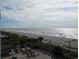 Panoramic ocean view with beach and pool area visible at 1501 S Ocean Blvd. # 429, Myrtle Beach, SC 29577