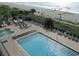 Inviting pool area with plenty of lounge chairs and ocean views at 1501 S Ocean Blvd. # 429, Myrtle Beach, SC 29577