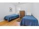 Bedroom with twin beds, dresser and hardwood floors at 624 River Oaks Dr. # 52G, Myrtle Beach, SC 29579