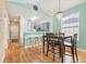 Charming dining area with wood floors and a light-filled ambiance at 624 River Oaks Dr. # 52G, Myrtle Beach, SC 29579