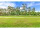 View of a beautiful green landscape with large trees at 624 River Oaks Dr. # 52G, Myrtle Beach, SC 29579