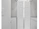 Convenient laundry area with washer, dryer, and shelving at 624 River Oaks Dr. # 52G, Myrtle Beach, SC 29579