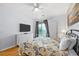 Bedroom with a queen bed, TV and access to balcony at 624 River Oaks Dr. # 52G, Myrtle Beach, SC 29579